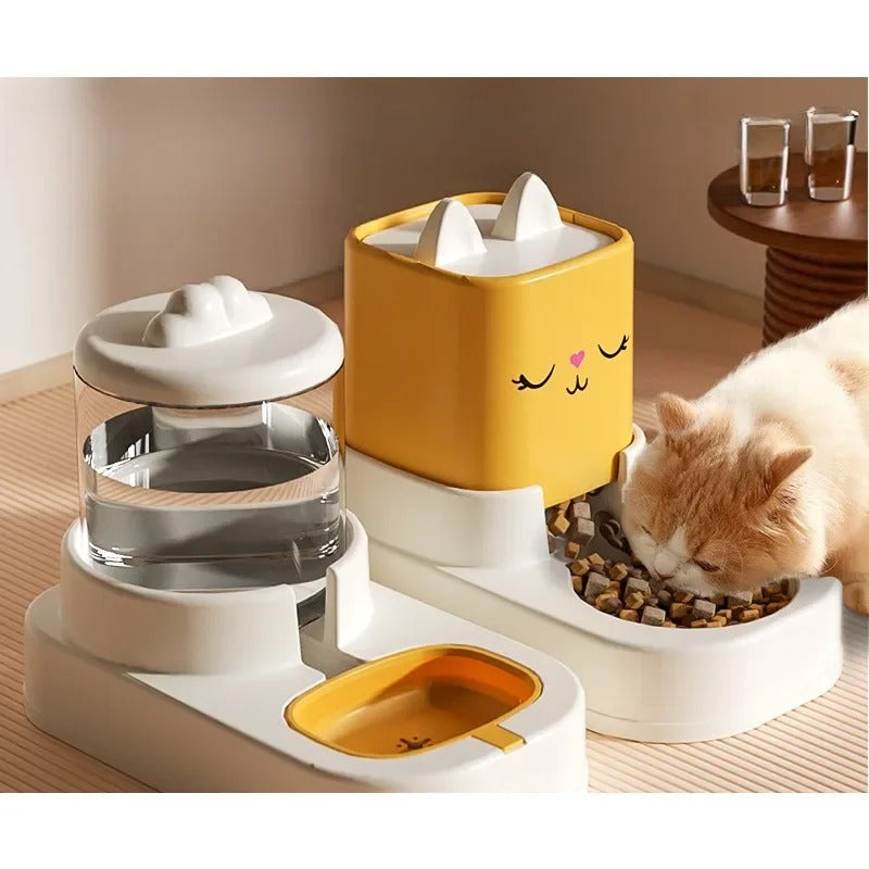chat mange dans distributeur eau et croquettes pour chat jaune